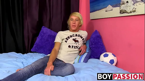 Interviewed young guy strokes his shaved cock and cums