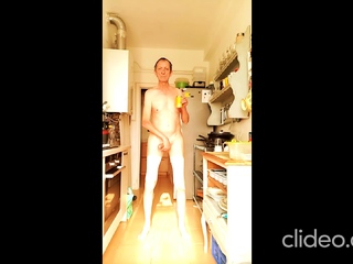 nude in my kitchen drinking a beer