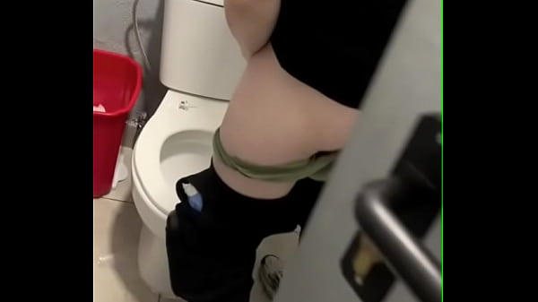 boy opens cubicle and catch his friend peeing (in a club’s public toilets)